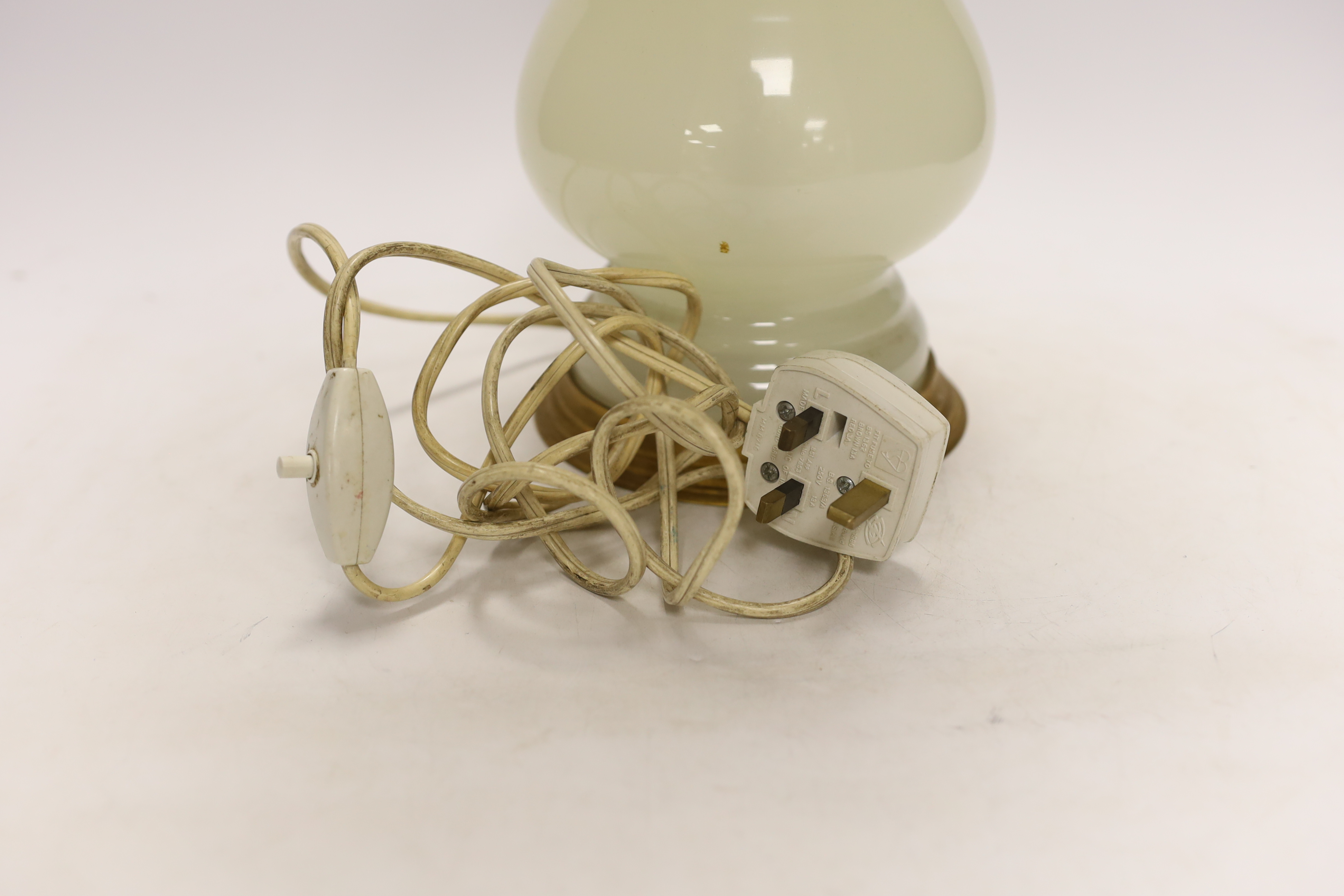 An opaque glass oil converted to a table lamp, 66cm high